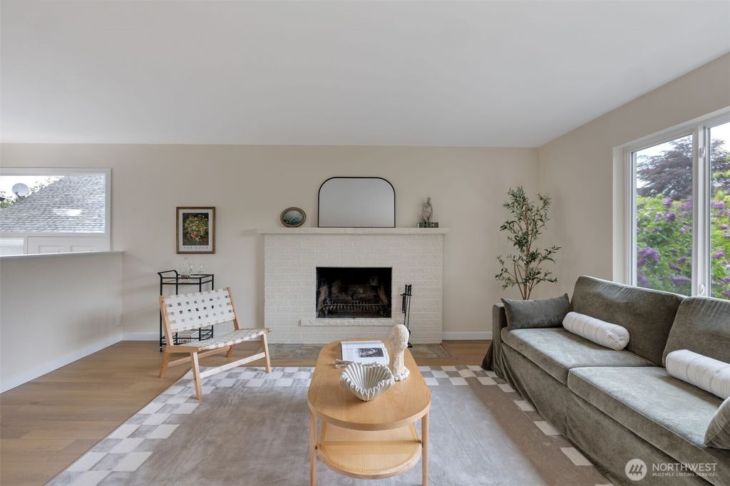 Photo of 7727 27th Avenue NW, Seattle, WA 98117 (MLS # 2524913)