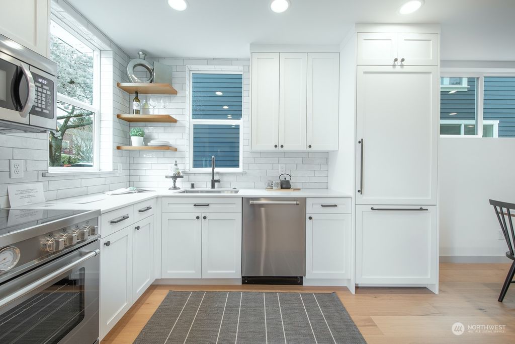 Photo of 8308 9th Avenue NW, Seattle, WA 98117 (MLS # 2207007)