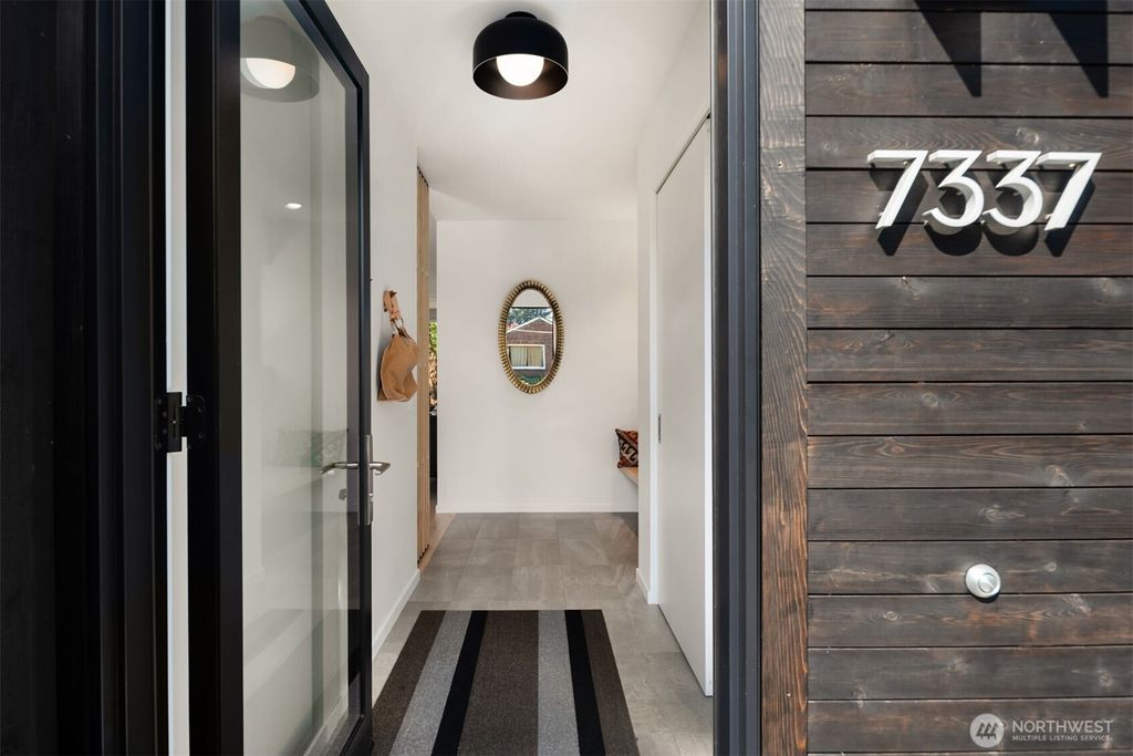 Photo of 7337 10th Avenue NW, Seattle, WA 98117 (MLS # 2513835)