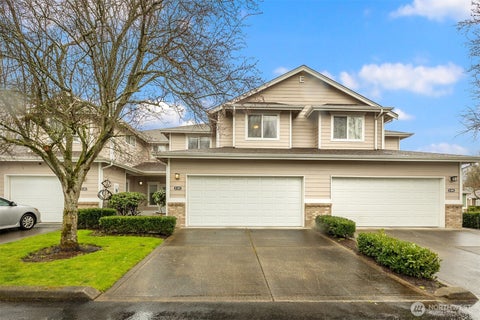 Photo of 10700 SE 260th Street #E103, Kent, WA 98030 (MLS # 2535391)