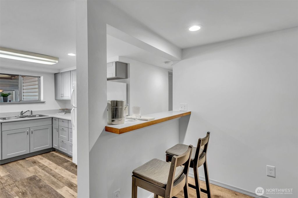 Photo of 9480 Olson Place SW #B, Seattle, WA 98106 (MLS # 2415213)