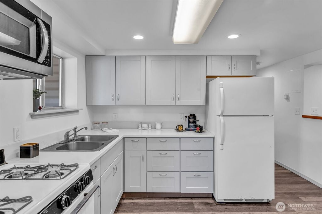 Photo of 9480 Olson Place SW #B, Seattle, WA 98106 (MLS # 2415213)