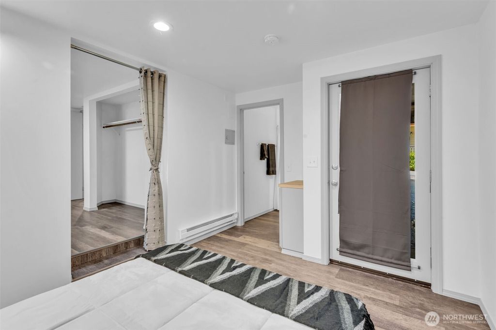Photo of 9480 Olson Place SW #B, Seattle, WA 98106 (MLS # 2415213)