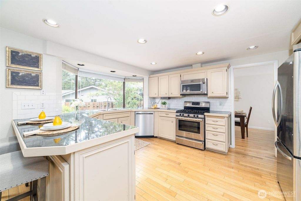 Photo of 12823 SE 235th Place, Kent, WA 98031 (MLS # 2372250)