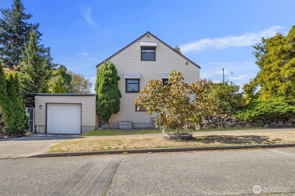 Photo of 3703 SW Tillman Street, Seattle, WA 98126 (MLS # 2442168)