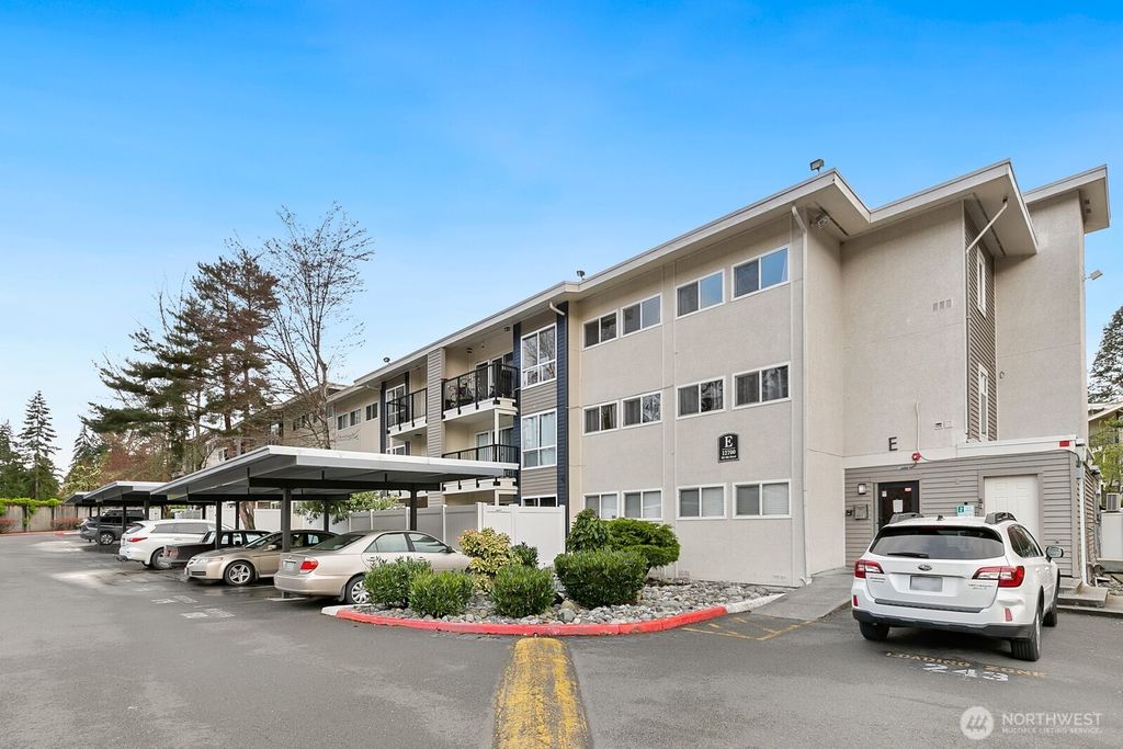 Photo of 12700 NE 8th Street #E-205, Bellevue, WA 98005 (MLS # 2427174)