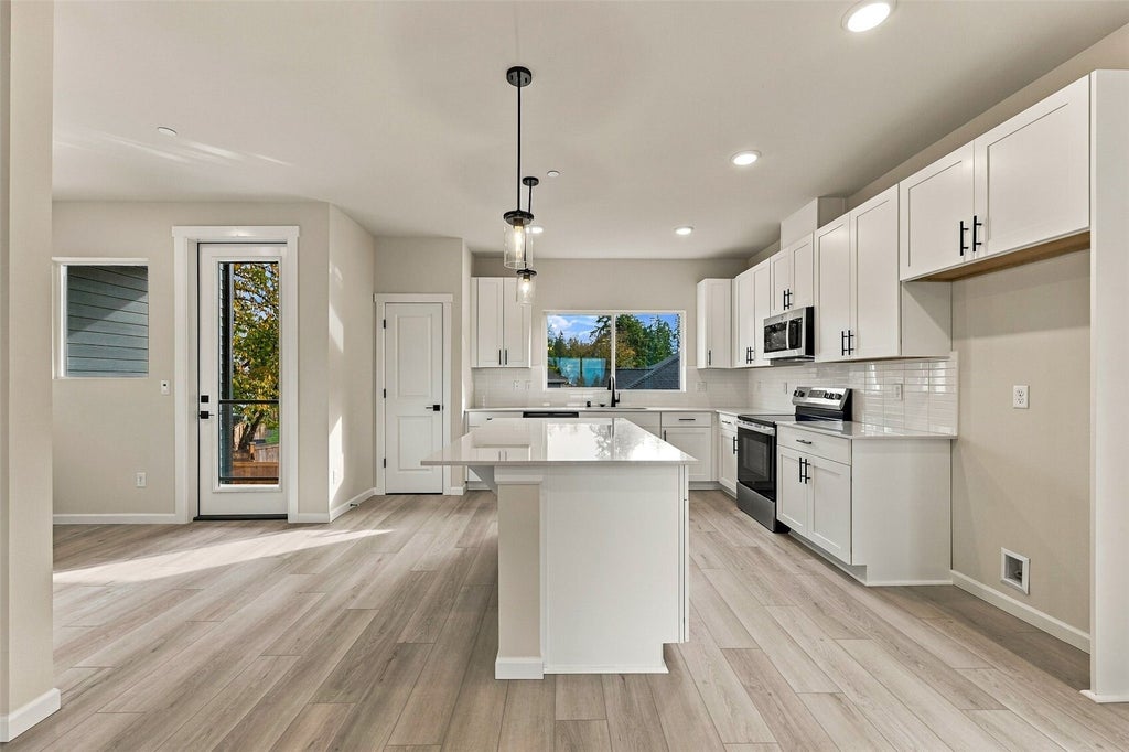 Photo of 27010 187th Place Pl SE #101, Covington, WA 98042 (MLS # 2600016)