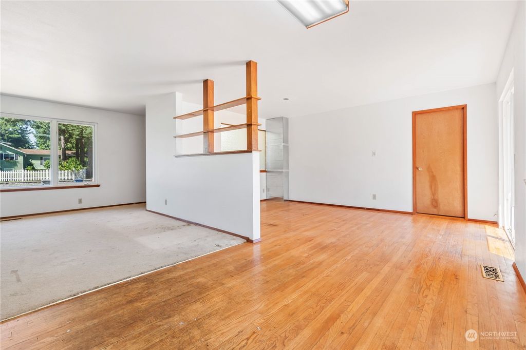 Photo of 11800 5th Avenue S, Seattle, WA 98168 (MLS # 2144845)