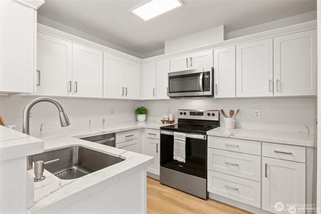 Photo of 9210 Market Place #E102, Lake Stevens, WA 98258 (MLS # 2528239)