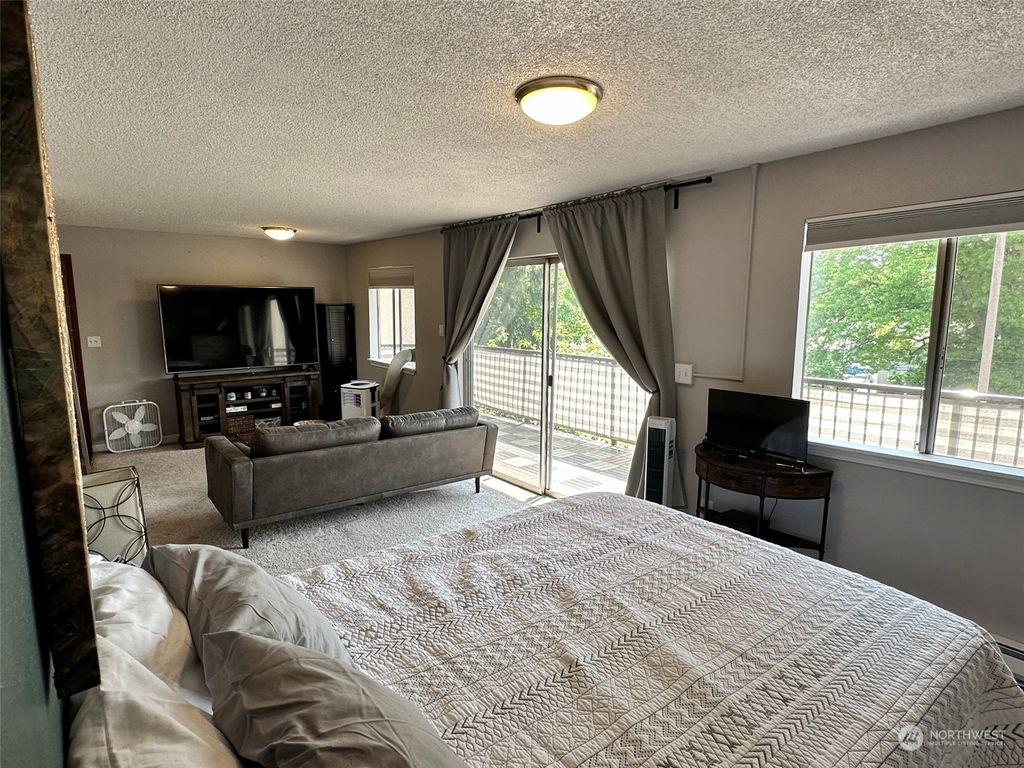 Photo of 9030 Seward Park Avenue S #400, Seattle, WA 98118 (MLS # 2072830)