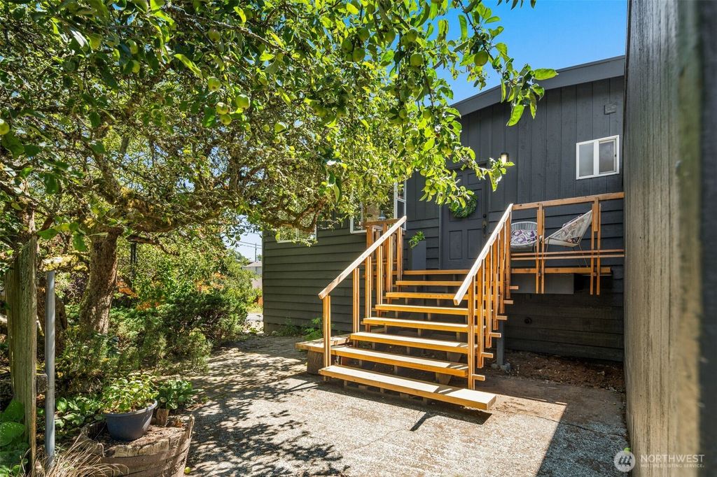 Photo of 2103 SW 110th Street, Seattle, WA 98146 (MLS # 2409001)