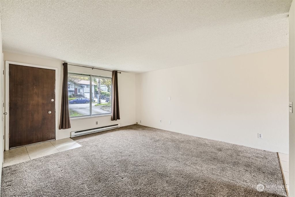 Photo of 6747 16th Avenue SW, Seattle, WA 98106 (MLS # 2055991)
