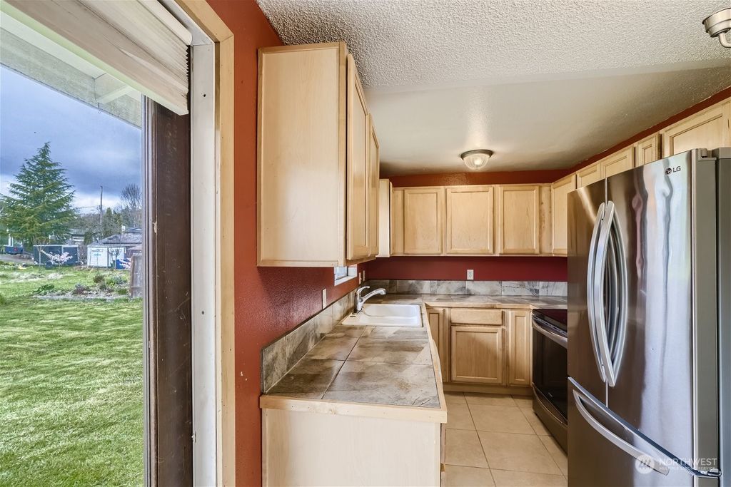 Photo of 6747 16th Avenue SW, Seattle, WA 98106 (MLS # 2055991)