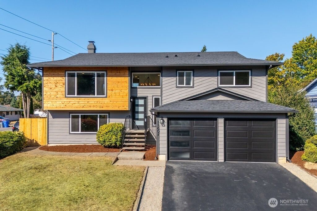 Photo of 11602 SE 210th Place, Kent, WA 98031 (MLS # 2438285)