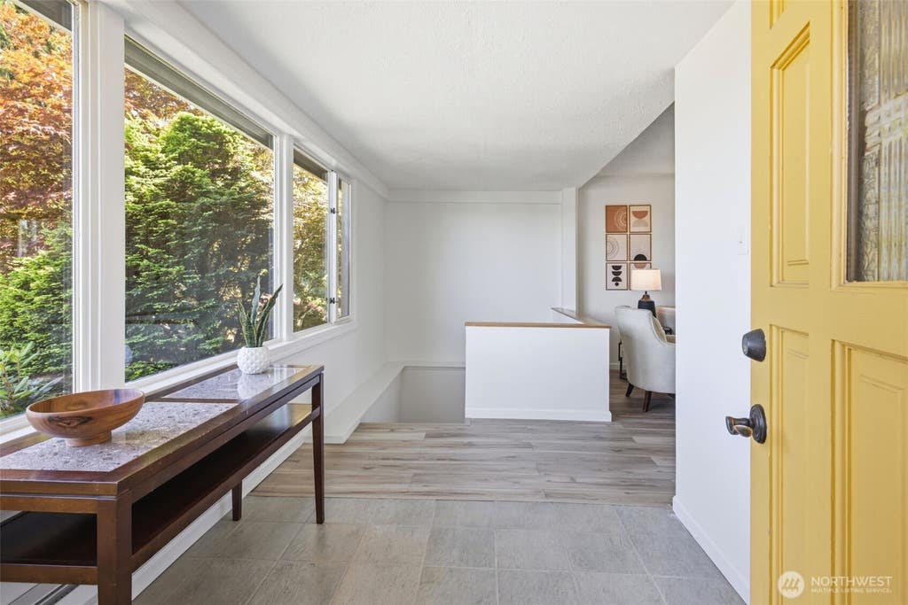 Photo of 10209 64th Avenue S, Seattle, WA 98178 (MLS # 2539605)