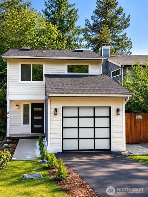 Photo of 1039 NE 113th Street, Seattle, WA 98125 (MLS # 2494114)