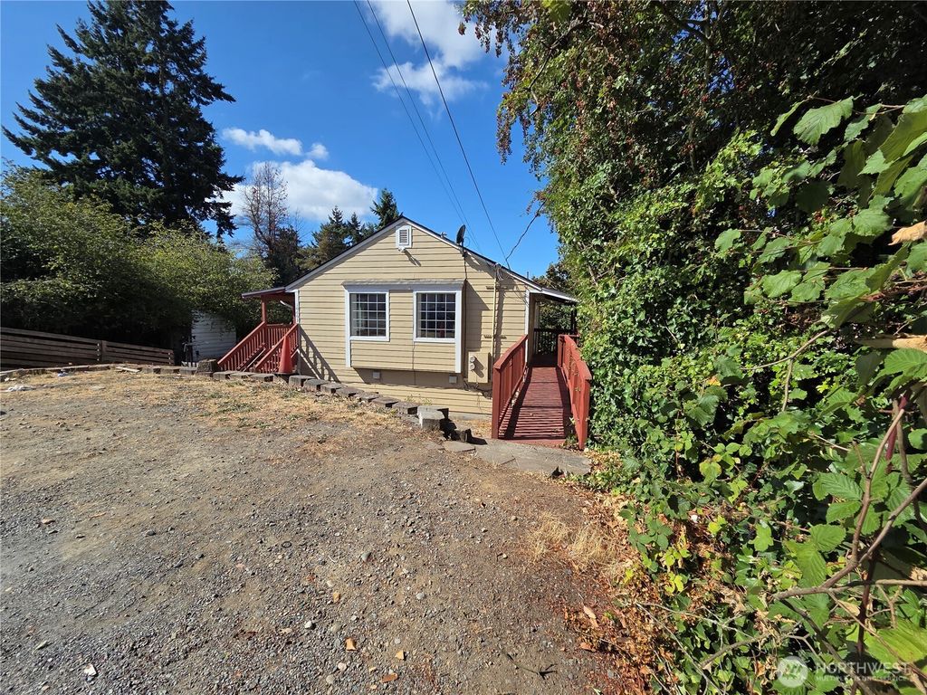 Photo of 10603 12th Avenue SW, Seattle, WA 98146 (MLS # 2435841)