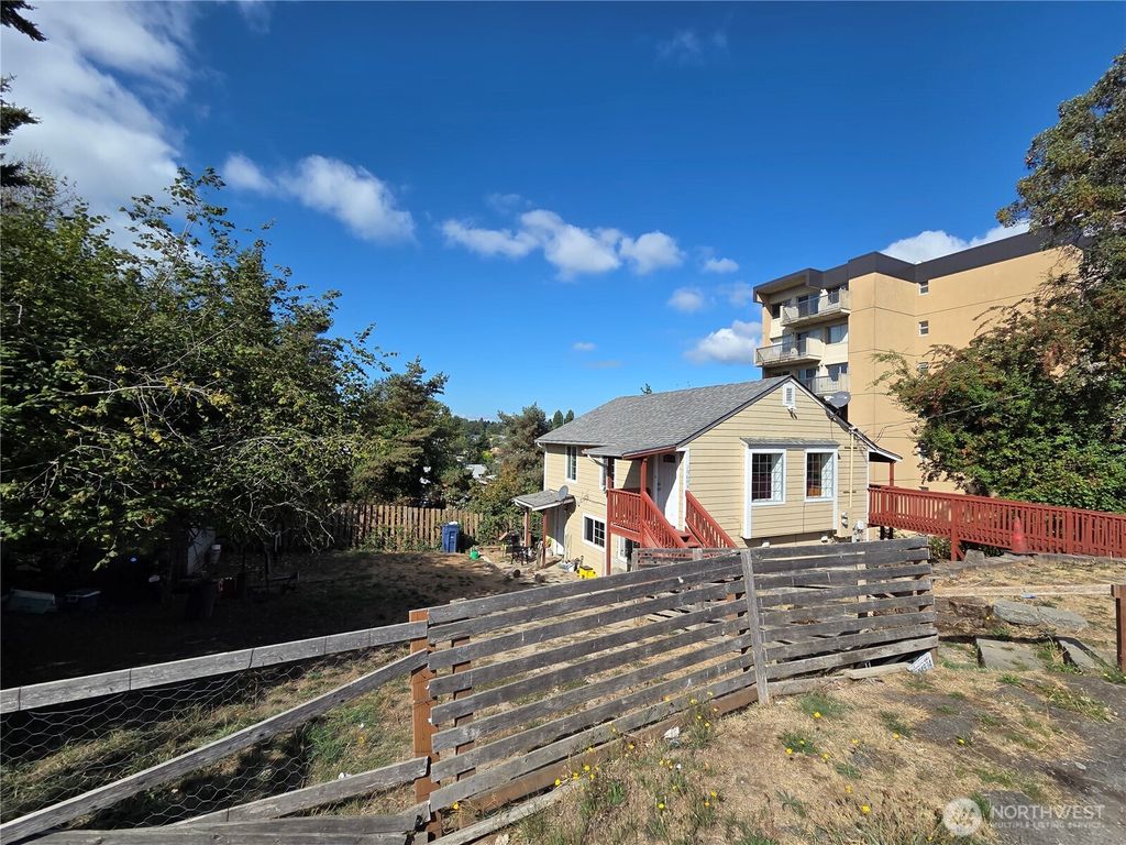 Photo of 10603 12th Avenue SW, Seattle, WA 98146 (MLS # 2435841)