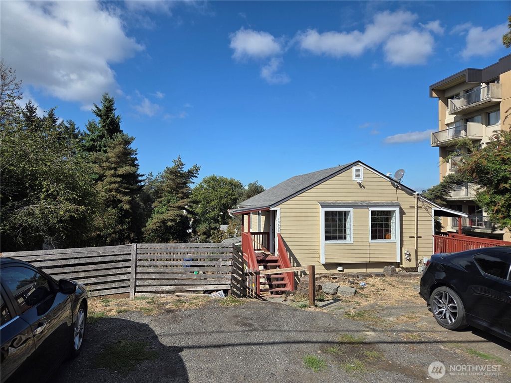 Photo of 10603 12th Avenue SW, Seattle, WA 98146 (MLS # 2435841)