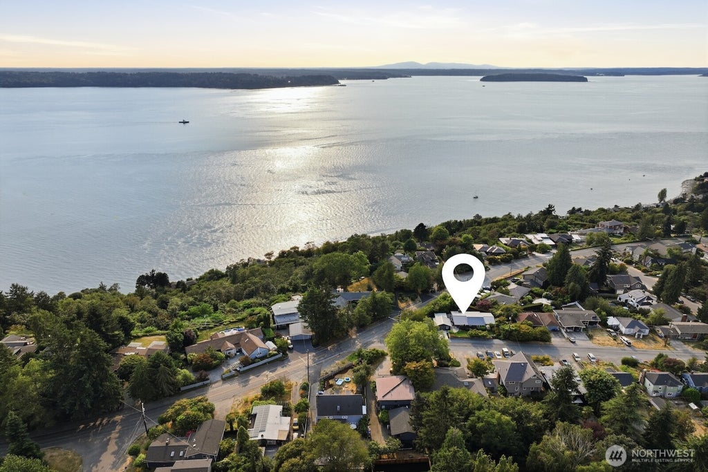 Photo of 10233 44th Avenue SW, Seattle, WA 98146 (MLS # 2573491)