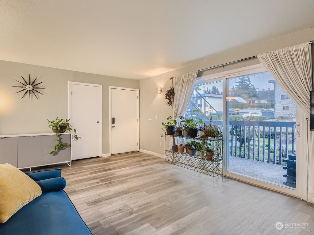 Photo of 22997 Marine View Drive S #D102, Des Moines, WA 98198 (MLS # 2026141)
