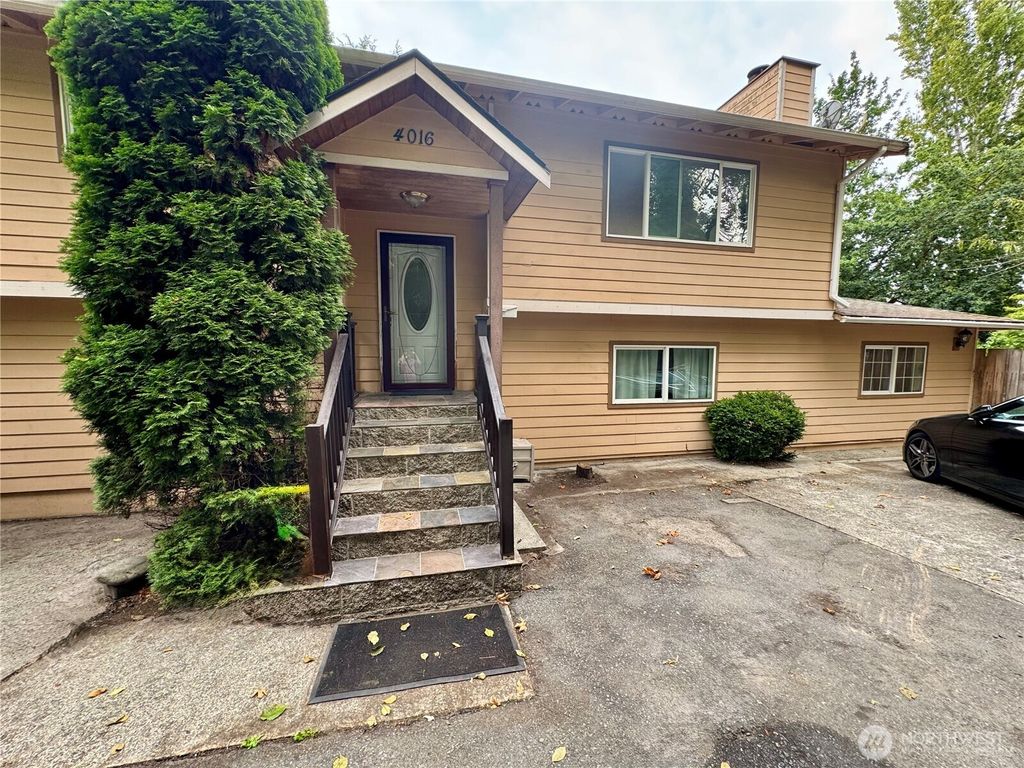 Photo of 4016 Burton Place W, Seattle, WA 98199 (MLS # 2431100)