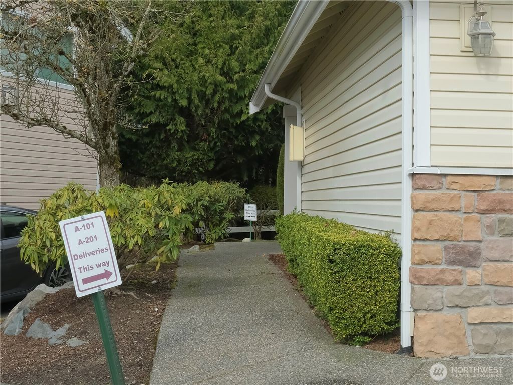Photo of 15806 18th Ave W Ave #A-101, Lynnwood, WA 98087 (MLS # 2475003)