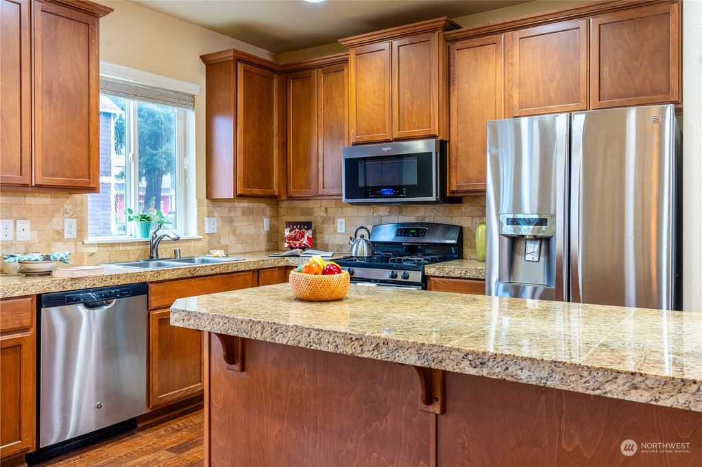 Photo of 11327 4th Place SW, Seattle, WA 98146 (MLS # 2210244)