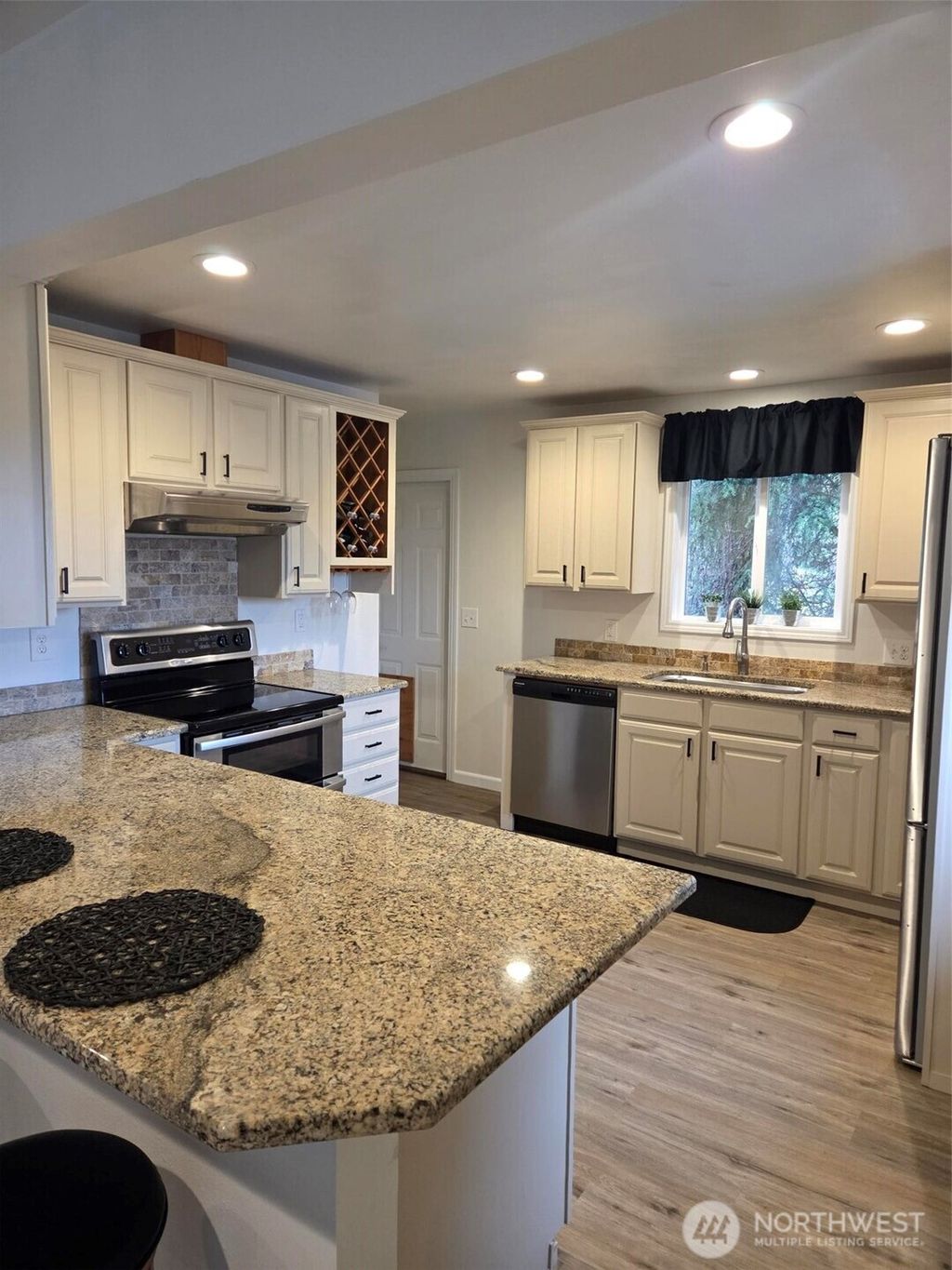 Photo of 4738 Rucker Avenue, Everett, WA 98203 (MLS # 2459850)