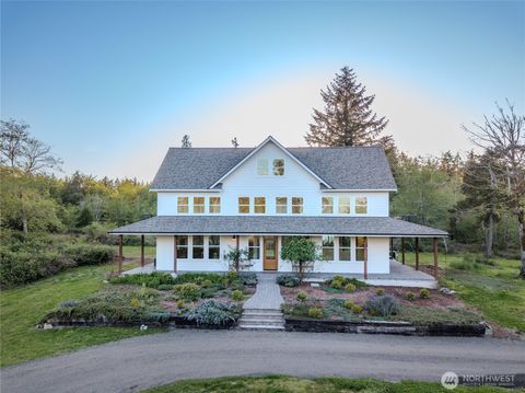 Photo of 9301 Lohrer Lane NE, Olympia, WA 98516 (MLS # 2514154)