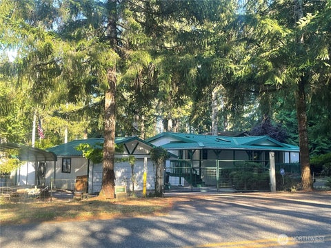 Photo of 1150 E Timberlakes Drive E, Shelton, WA 98584 (MLS # 2553015)