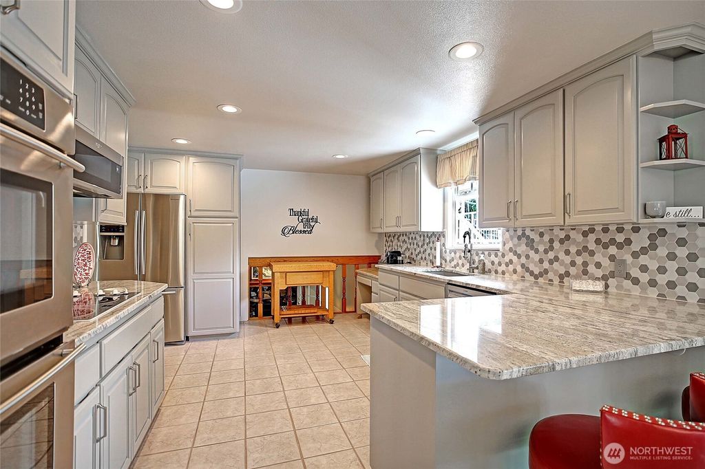 Photo of 17321 31st Drive NW, Arlington, WA 98223 (MLS # 2346418)