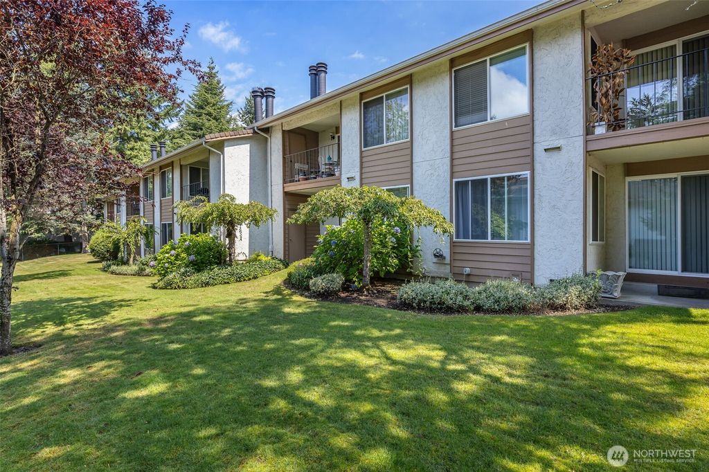 Photo of 12818 SE 41st Lane #B103, Bellevue, WA 98006 (MLS # 2424850)