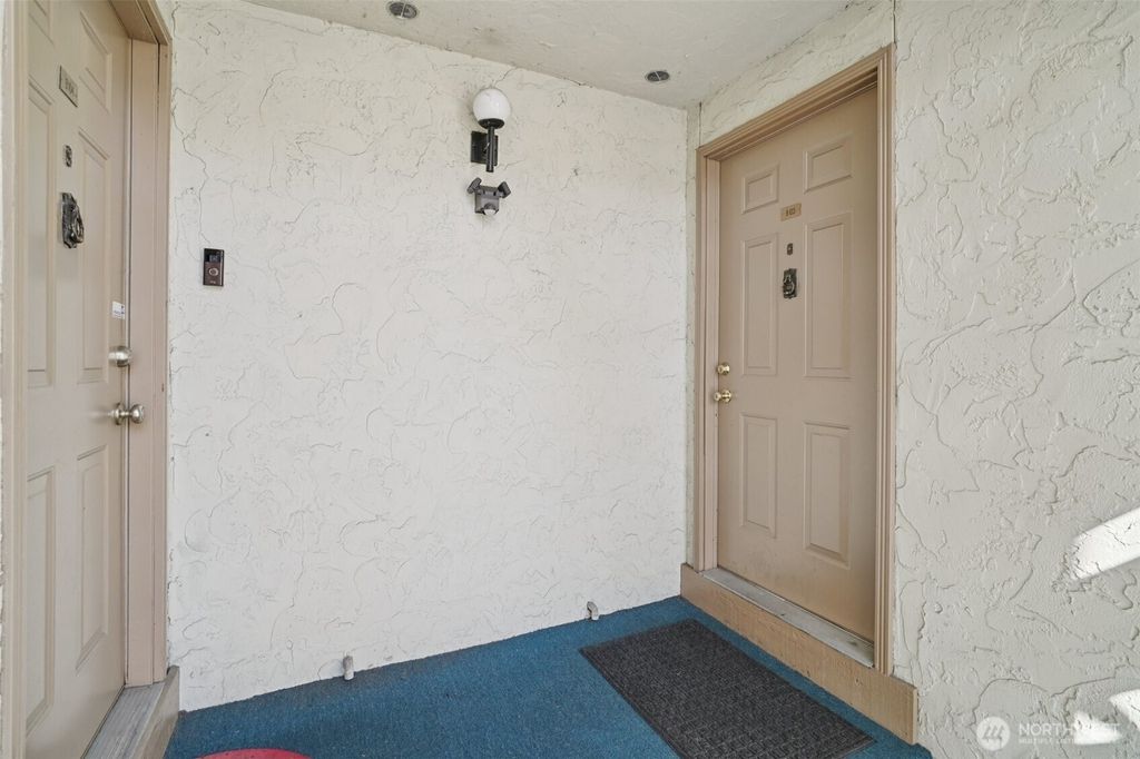 Photo of 12818 SE 41st Lane #B103, Bellevue, WA 98006 (MLS # 2424850)