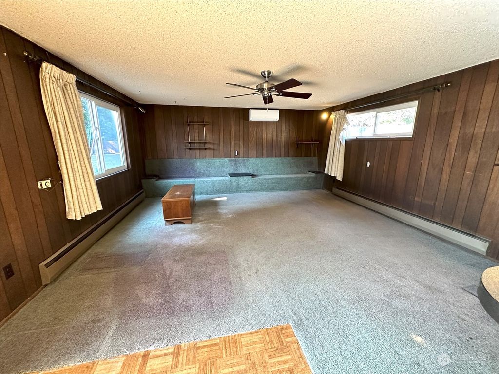 Photo of 12033 3rd Avenue NE, Seattle, WA 98125 (MLS # 2164947)