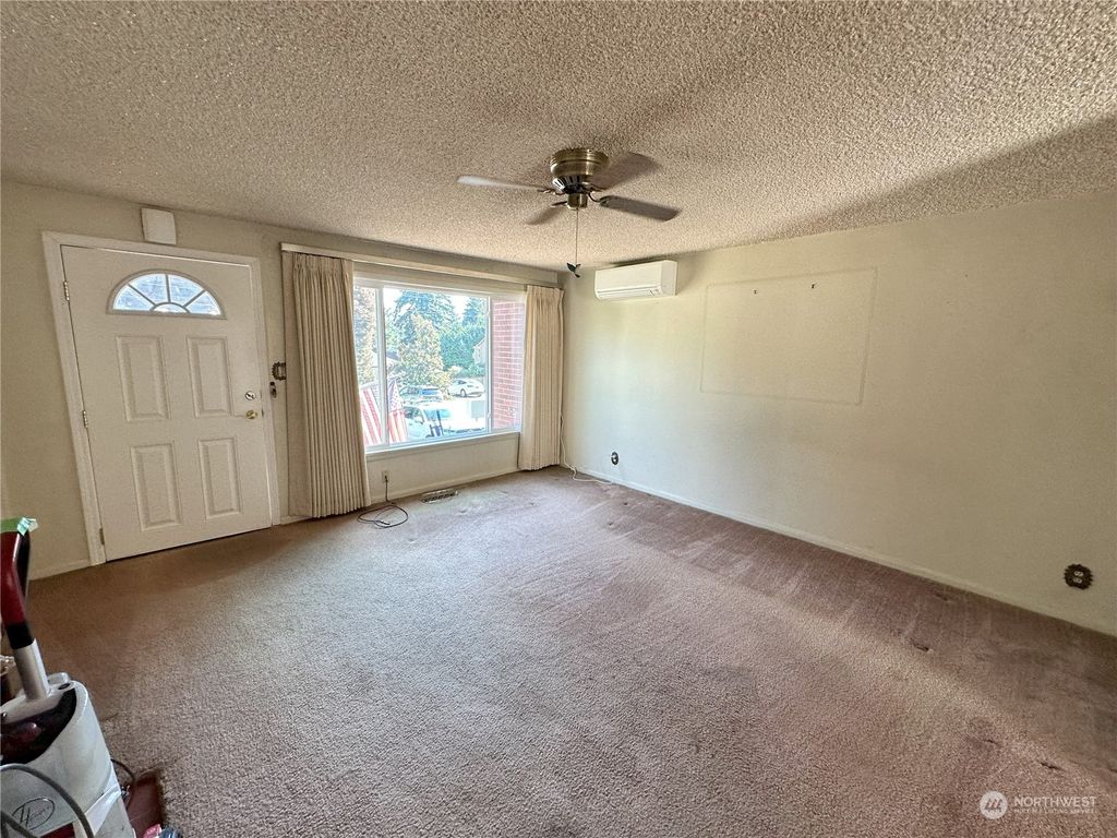 Photo of 12033 3rd Avenue NE, Seattle, WA 98125 (MLS # 2164947)