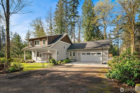 Photo of 10060 NE Springwood Lane, Bainbridge Island, WA 98110 (MLS # 2503574)