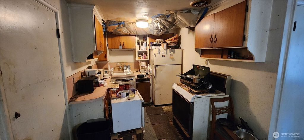 Photo of 1253 N 143rd Street, Seattle, WA 98133 (MLS # 2466833)