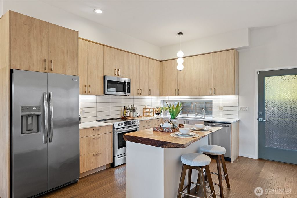 Photo of 8424 24th Avenue SW, Seattle, WA 98106 (MLS # 2522181)