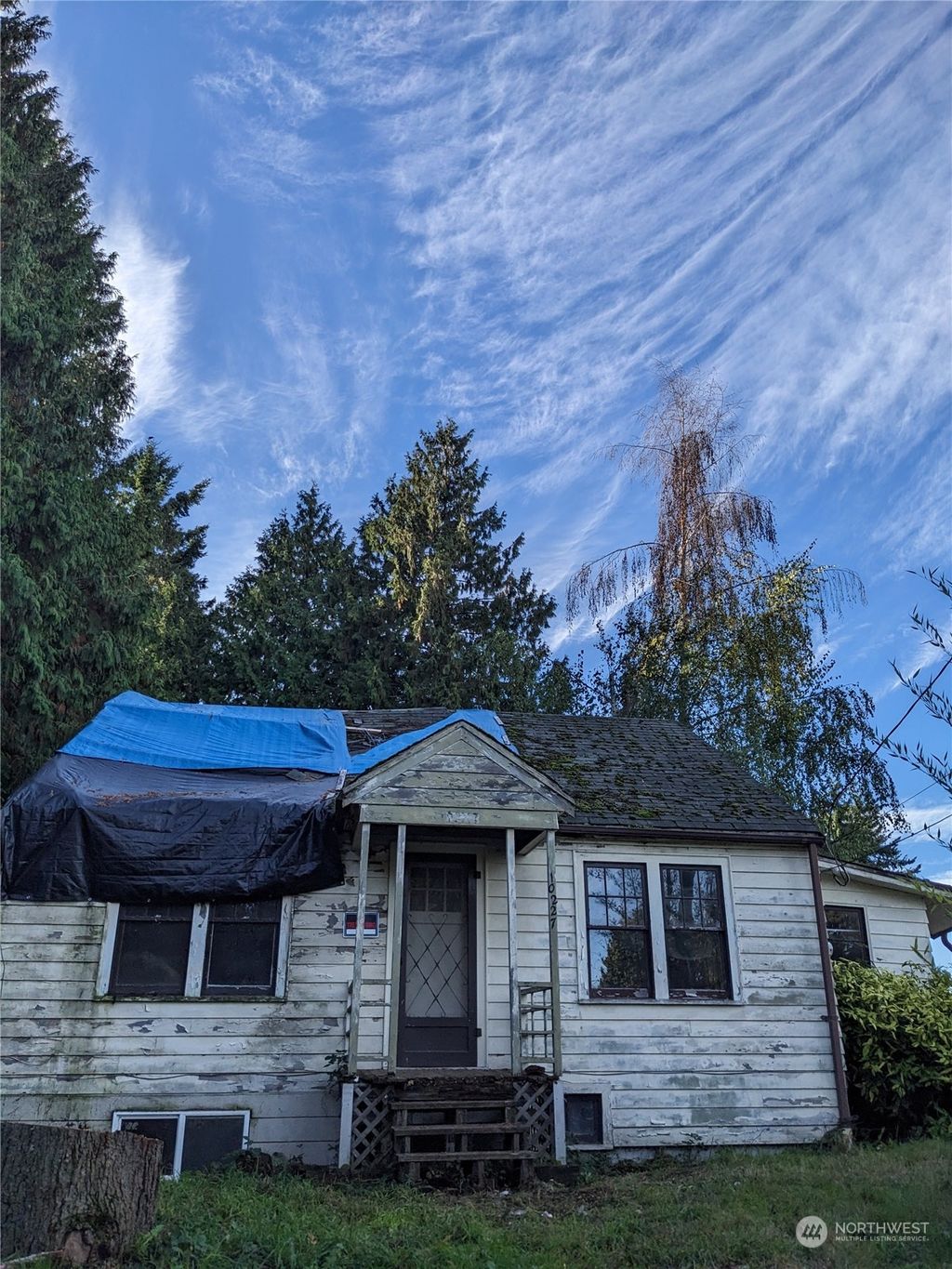 Photo of 10227 6th Avenue SW, Seattle, WA 98146 (MLS # 2174124)
