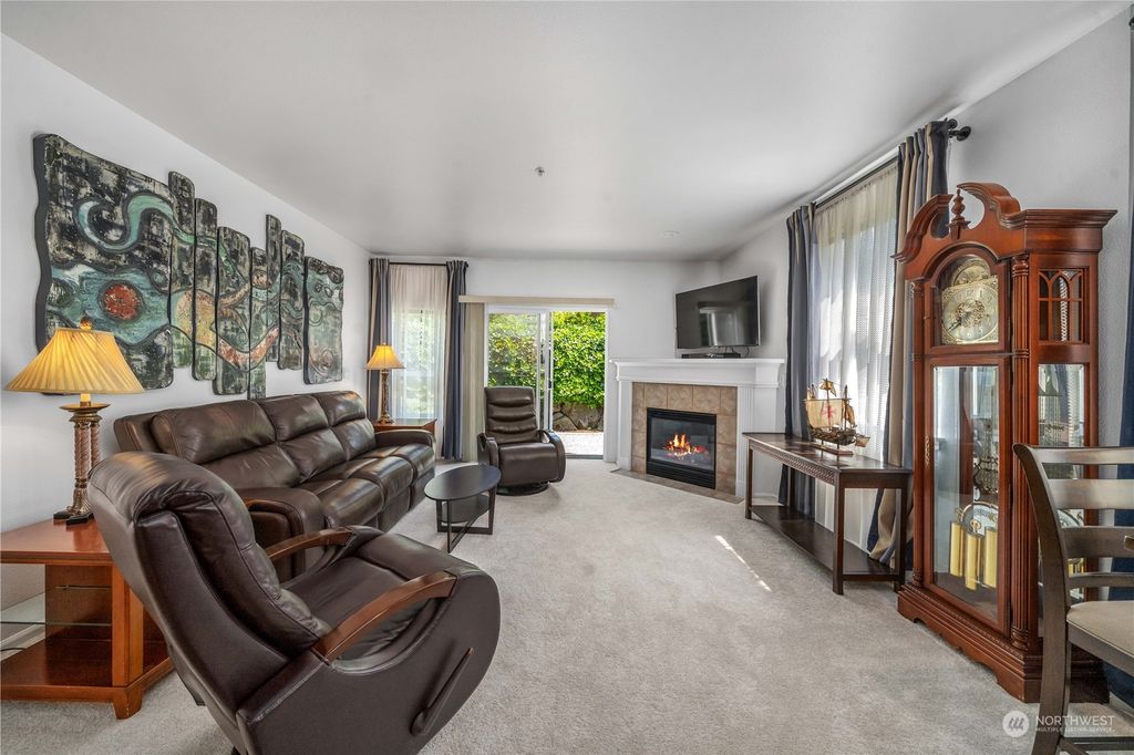 Photo of 4900 Talbot Road S #F, Renton, WA 98055 (MLS # 2076025)