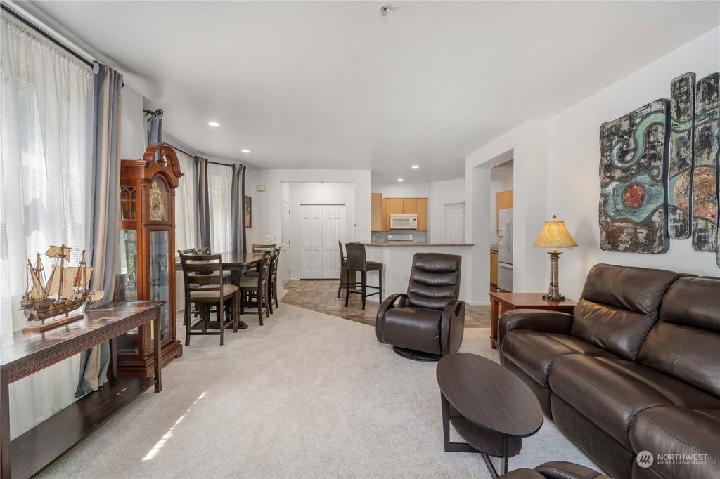 Photo of 4900 Talbot Road S #F, Renton, WA 98055 (MLS # 2076025)