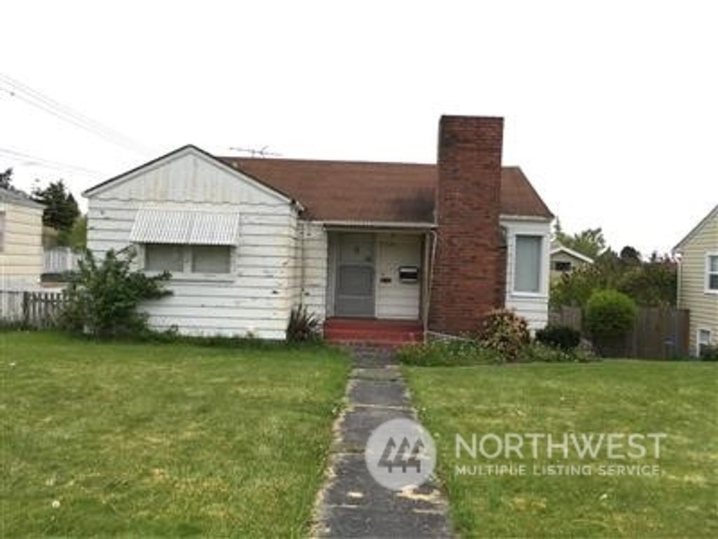 Photo of 7530 30th Avenue NW, Seattle, WA 98117 (MLS # 2046398)