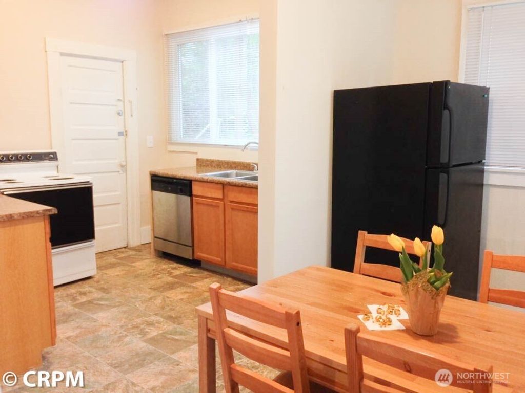 Photo of 5211 19th Avenue NE, Seattle, WA 98105 (MLS # 2456678)