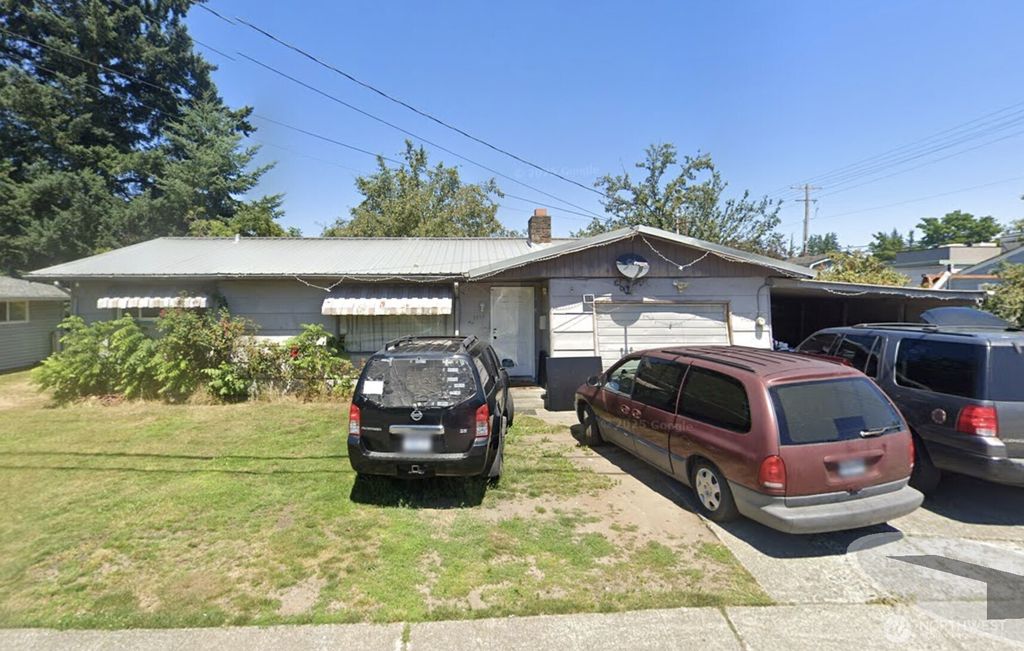 Photo of 1917 Grove Street, Marysville, WA 98270 (MLS # 2463064)