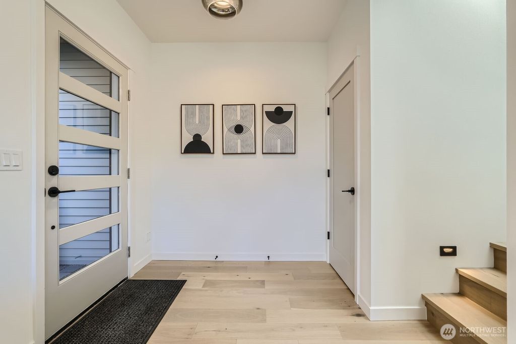 Photo of 8469 Seward Park Avenue S, Seattle, WA 98118 (MLS # 2338266)