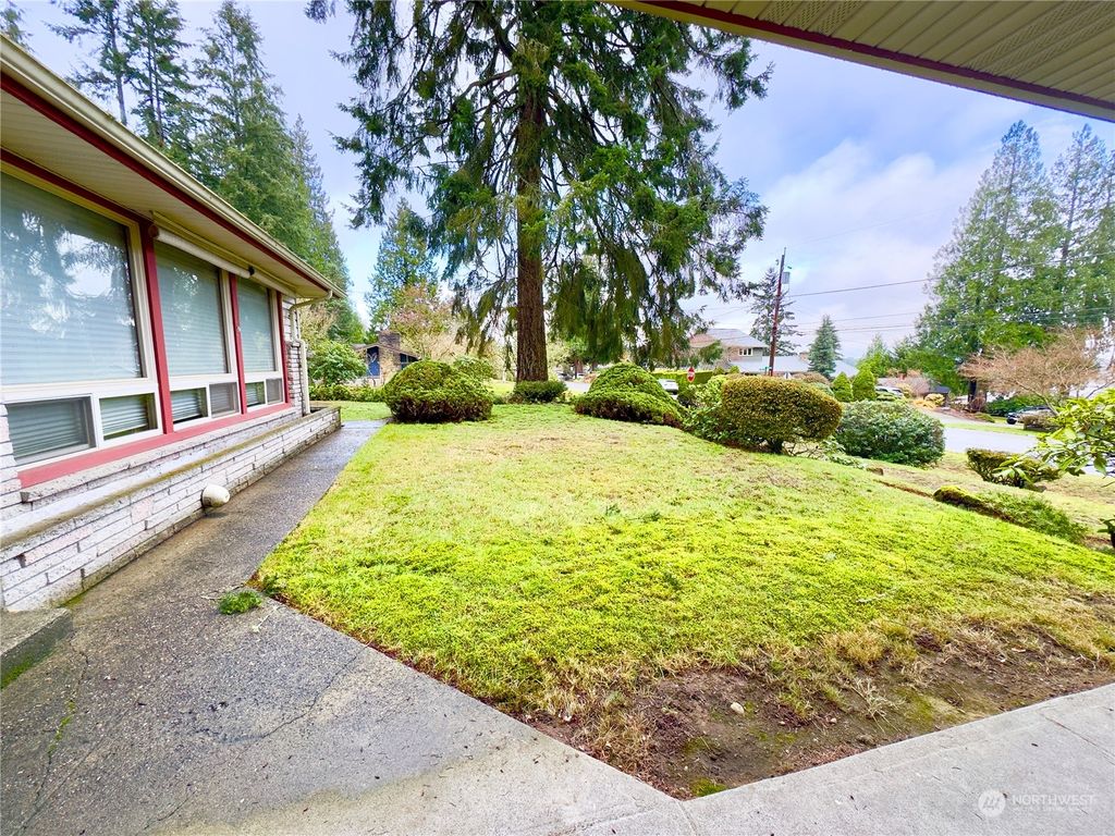 Photo of 16057 34th Ave NE Ave, Lake Forest Park, WA 98155 (MLS # 2319048)