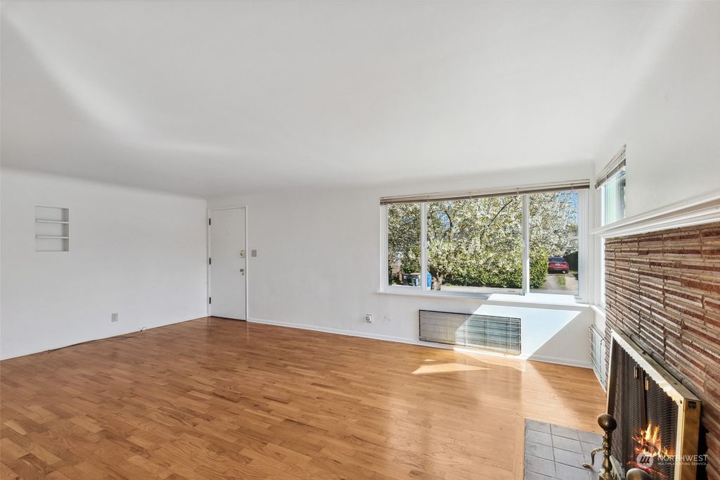 Photo of 8423 Seward Park Avenue S, Seattle, WA 98118 (MLS # 2212476)
