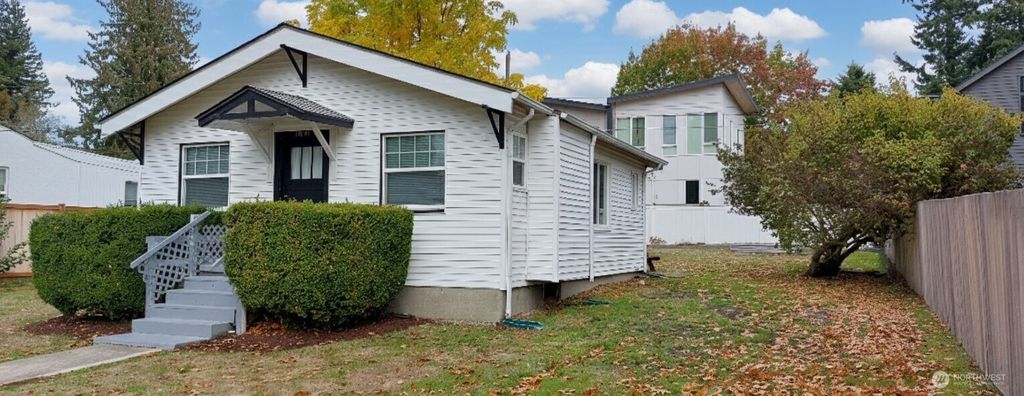 Photo of 11044 1st Avenue NW, Seattle, WA 98177 (MLS # 2446957)