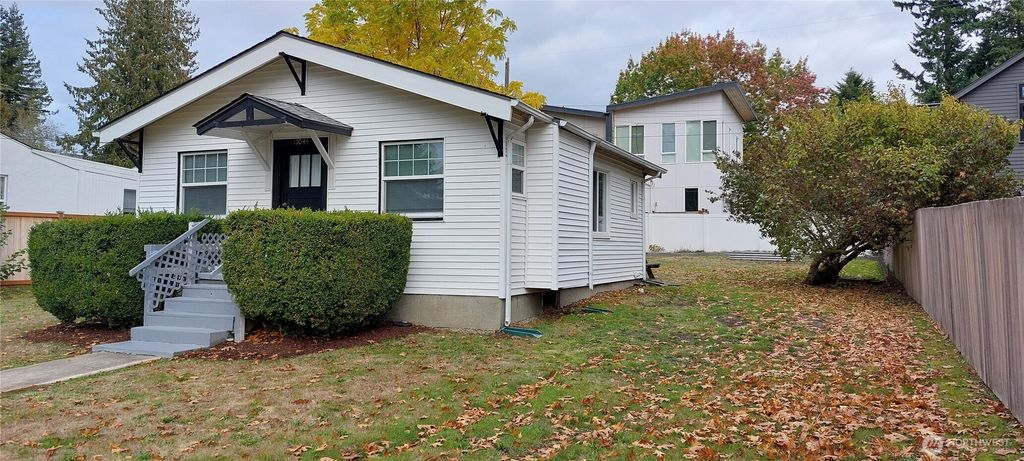 Photo of 11044 1st Avenue NW, Seattle, WA 98177 (MLS # 2446957)